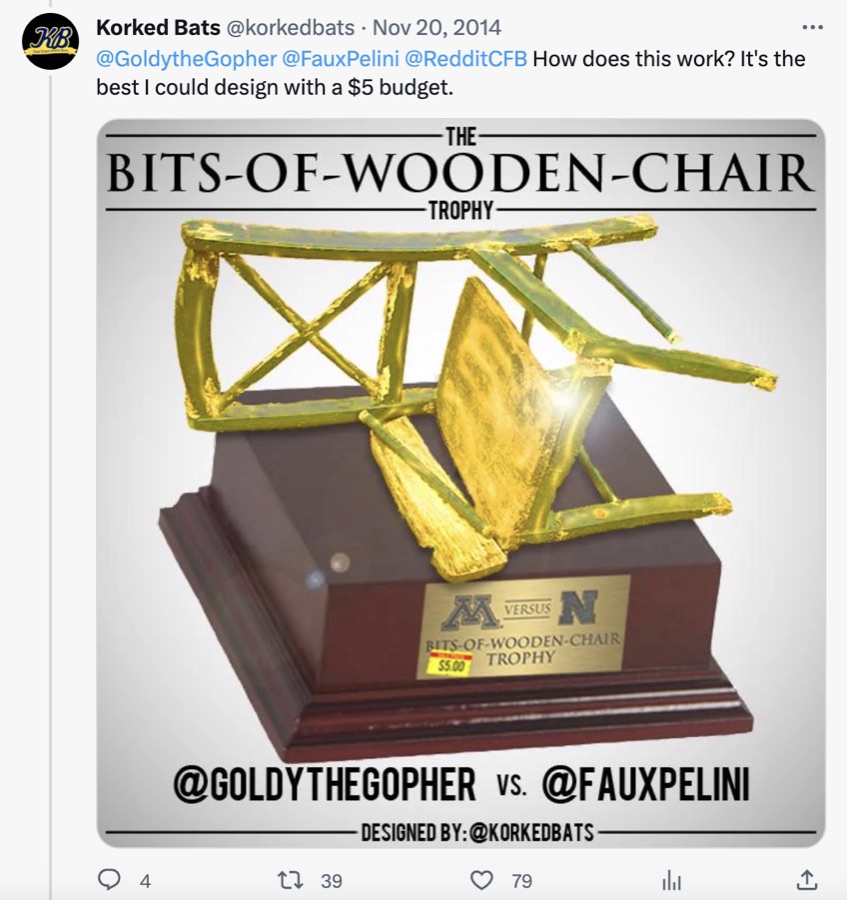 @korkedbats' mock-up of The Bits-of-Wooden-Chair Trophy: a gold broken chair on a wooden base with a $5.00 price sticker