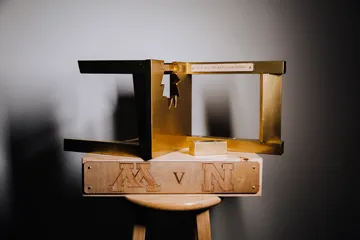 $5 Bits of Broken Chair Trophy between Nebraska & Minnesota